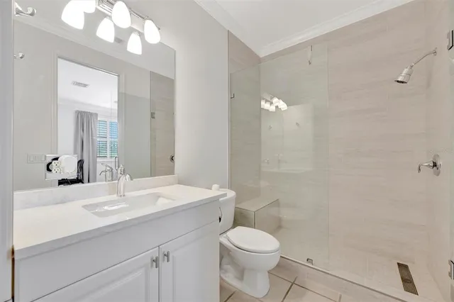 a living room with furniture and a garden