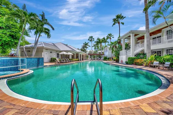 a front view of a house with parking space