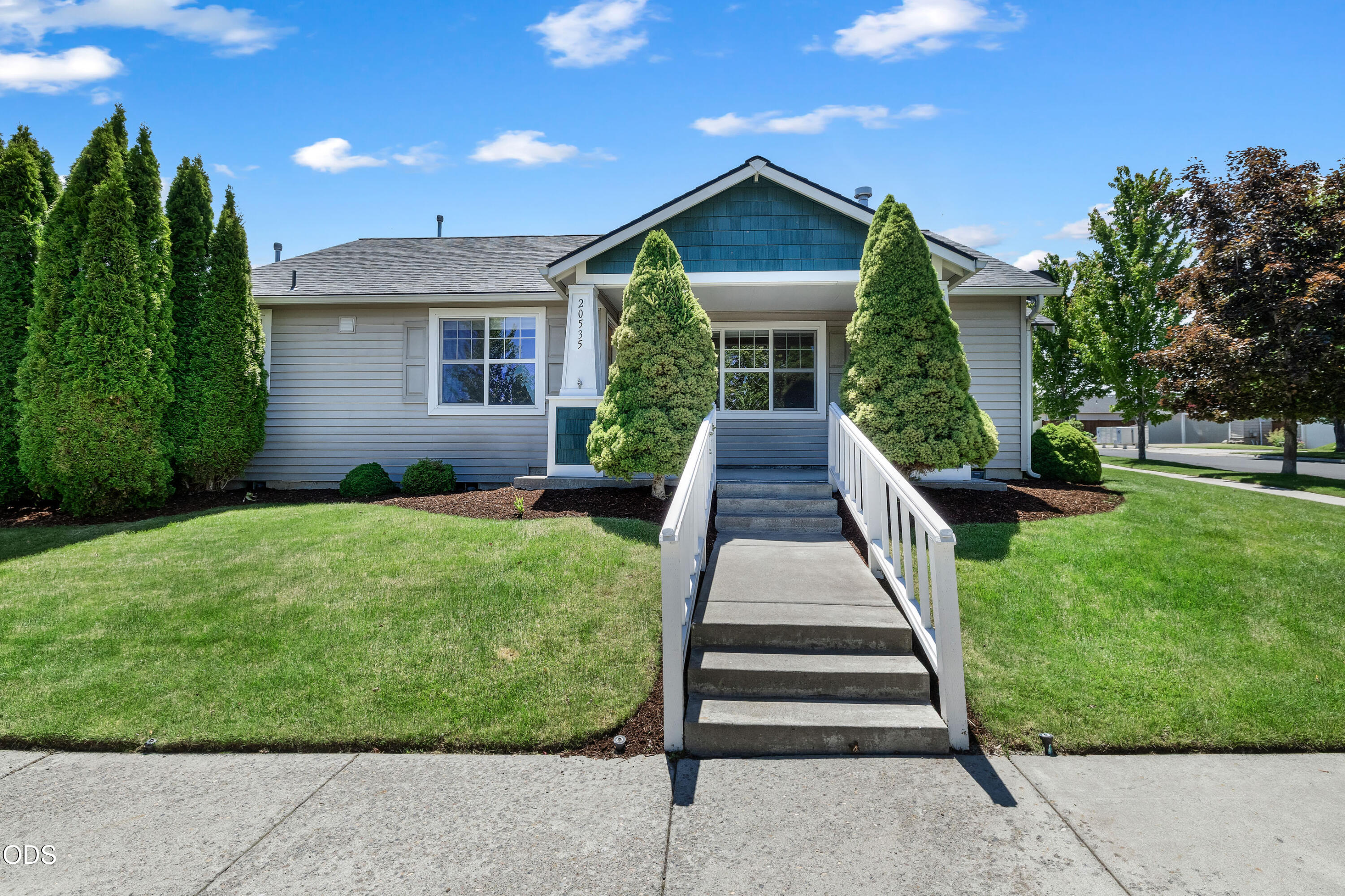 20535 Sunderland Way Bend, OR 97701 - Photo 1 of 41 a front view of a house with a yard