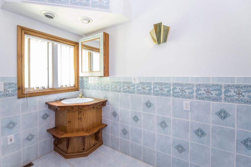 256 Mingo Road Wexford, PA 15090 - Photo 11 of 24 The master bath also has a custom made wormy chestnut vanity!