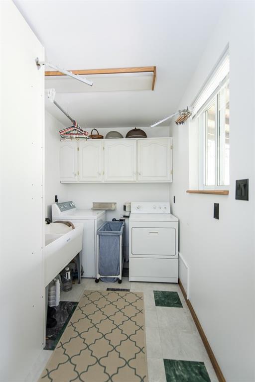 256 Mingo Road Wexford, PA 15090 - Photo 19 of 24 Convenience is at your fingertips with this main level laundry room with utility sink, overlooking the back yard.