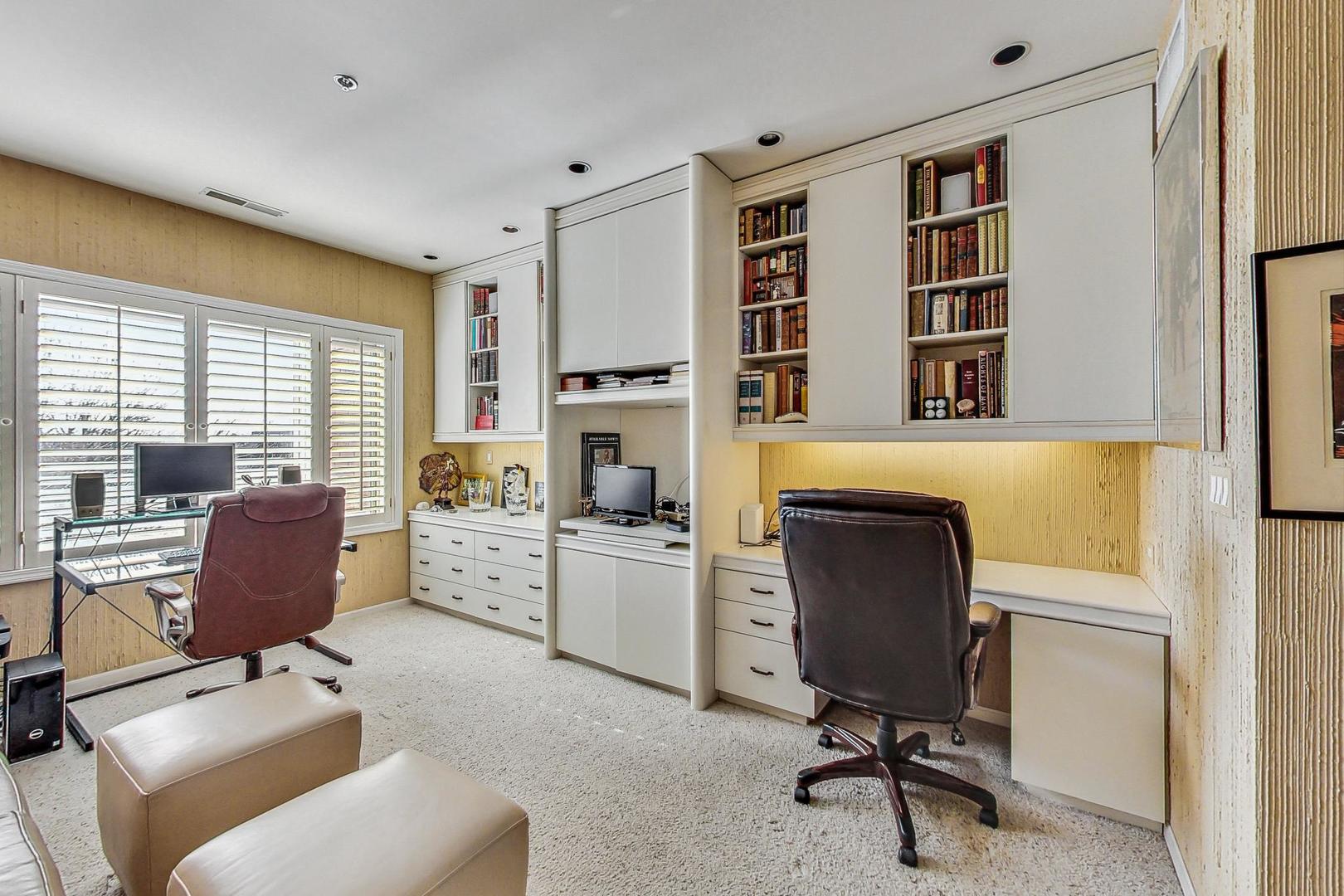 209 Rivershire Lane, Unit 503 Lincolnshire, IL 60069 - Photo 28 of 53 a view of a workspace with furniture and a window