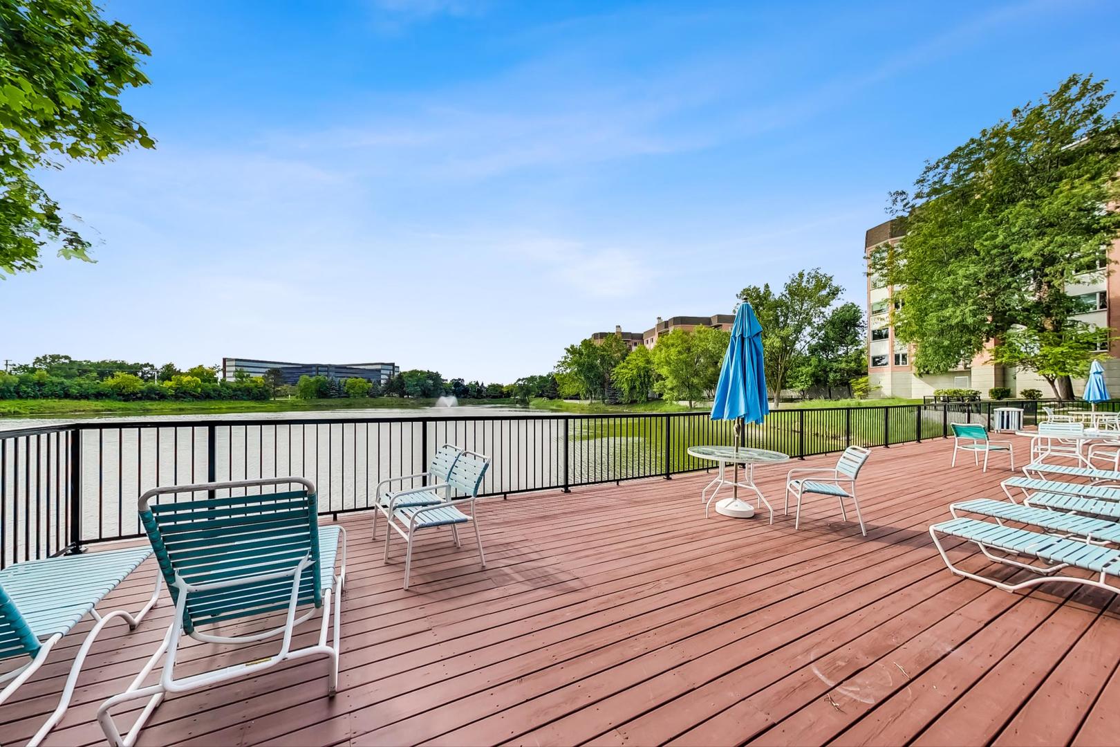 209 Rivershire Lane, Unit 503 Lincolnshire, IL 60069 - Photo 40 of 53 a view of deck with patio