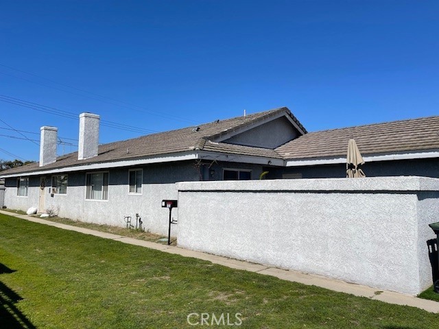 a view of a back yard of the house