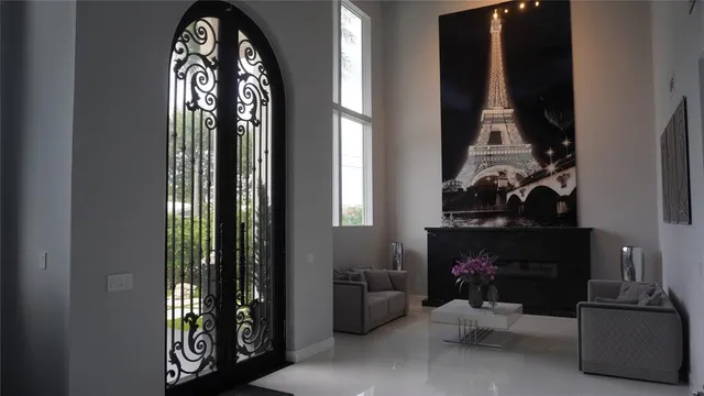 a kitchen with a sink and a large window