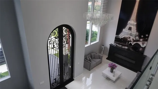 a kitchen with a table chairs sink and stove