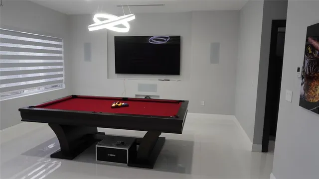 a bathroom with a shower and a sink