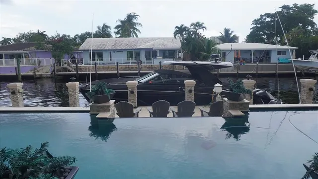a bathroom with a sink toilet and mirror