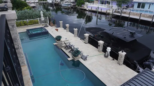 a terrace with outdoor seating and city view