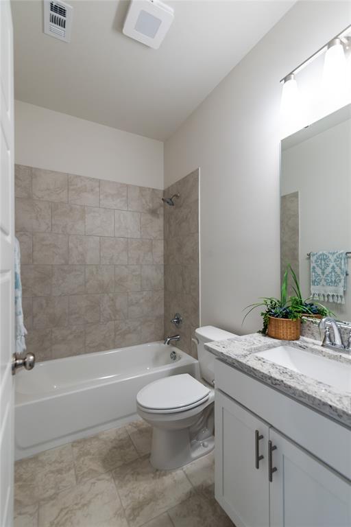 331 Prien Lk Loop Bossier City, LA 71111 - Photo 19 of 37 Bathroom featuring vanity and tub / shower combination