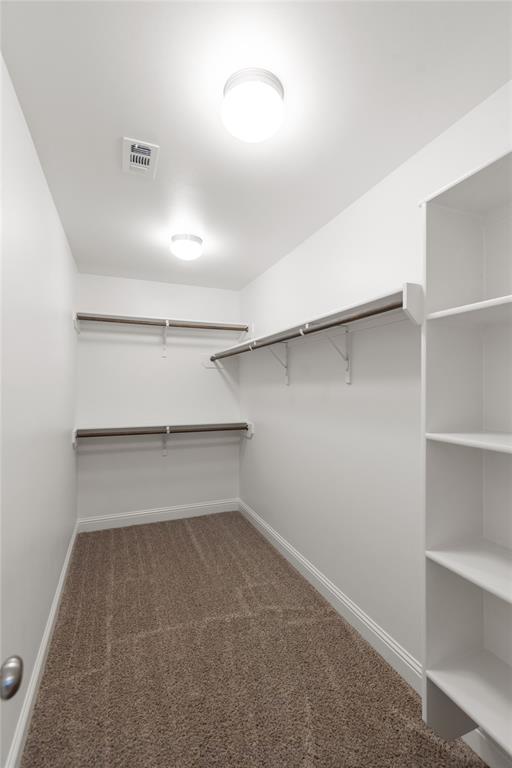 331 Prien Lk Loop Bossier City, LA 71111 - Photo 32 of 37 Spacious closet featuring dark colored carpet