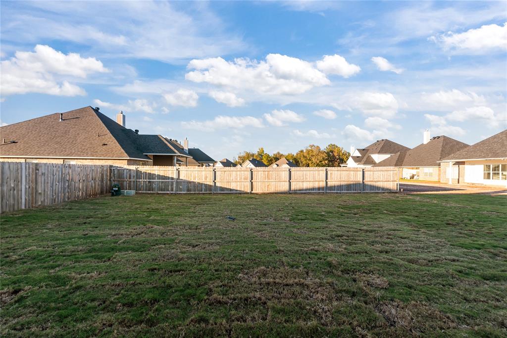331 Prien Lk Loop Bossier City, LA 71111 - Photo 35 of 37 Fenced backyard featuring a residential view