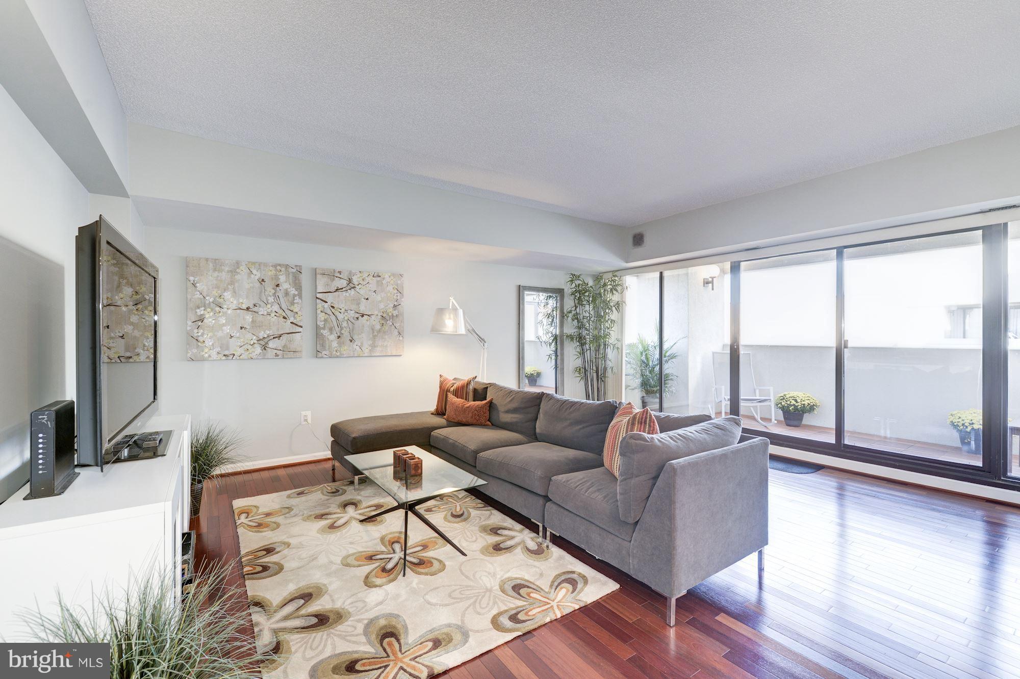 2311 M Street Northwest, Unit 1002 Washington, DC 20037 - Photo 6 of 29 Open Concept Living Room