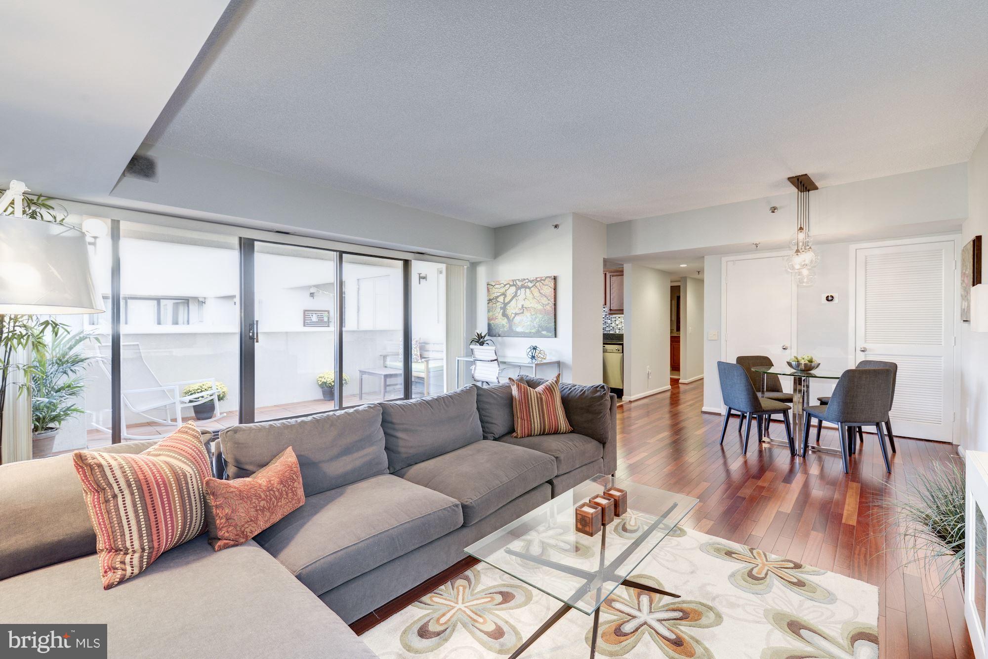 2311 M Street Northwest, Unit 1002 Washington, DC 20037 - Photo 7 of 29 Open Concept Living Room
