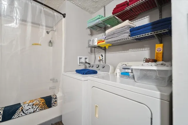 a utility room with dryer and washer
