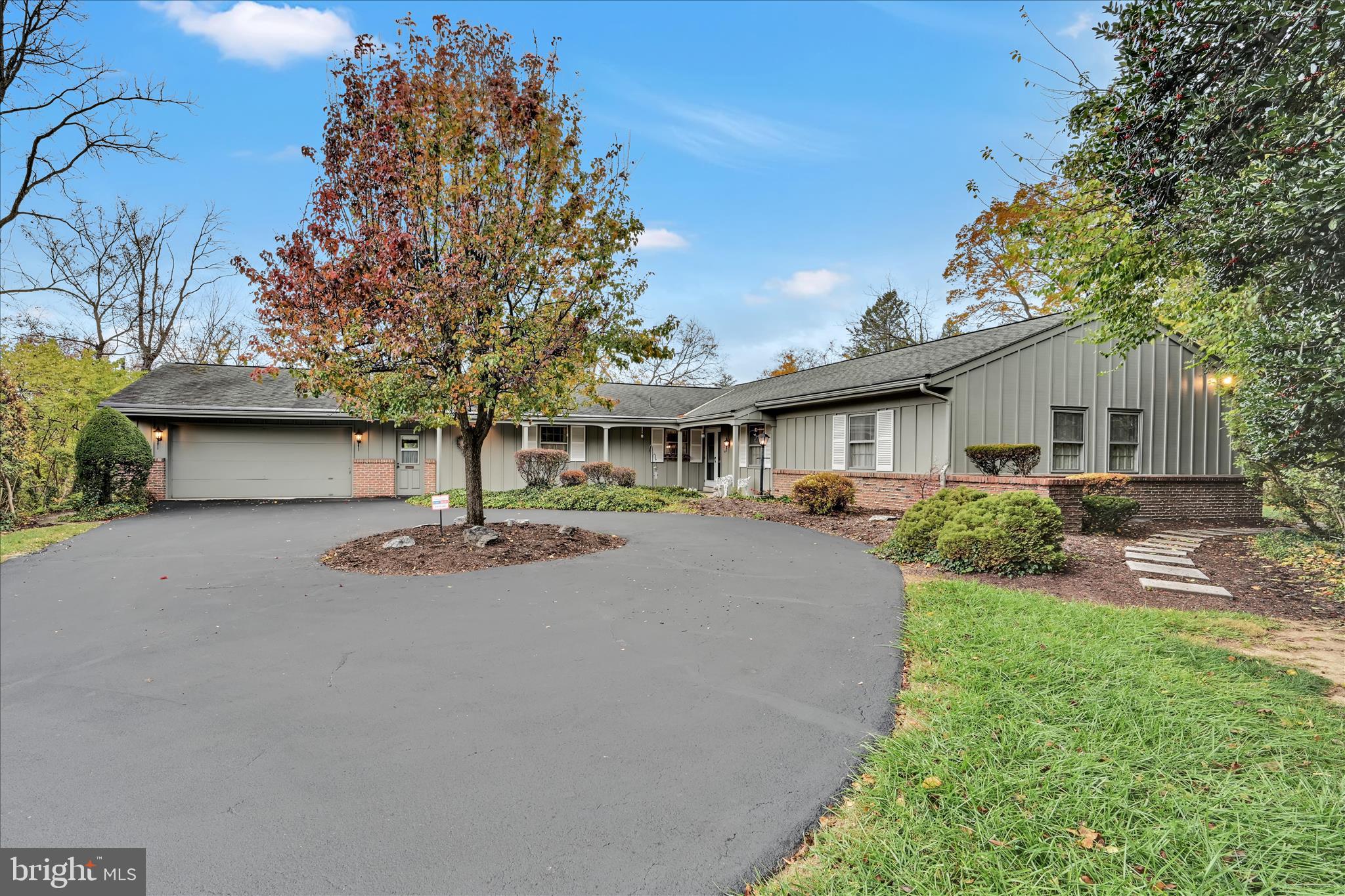 1451 Museum Road Wyomissing, PA 19610 - Photo 2 of 44 a front view of house with yard and green space