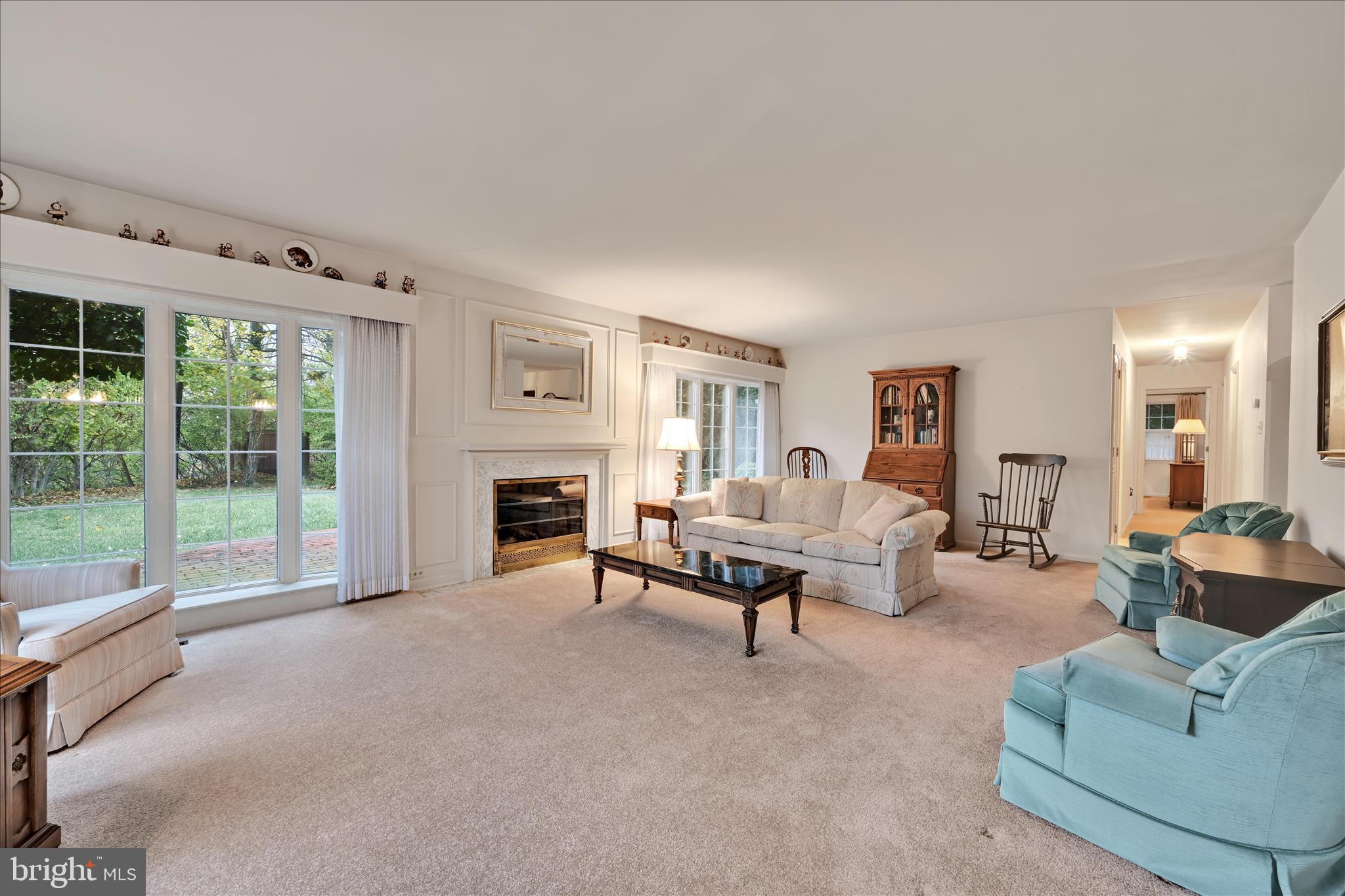 1451 Museum Road Wyomissing, PA 19610 - Photo 21 of 44 a living room with furniture and a fireplace