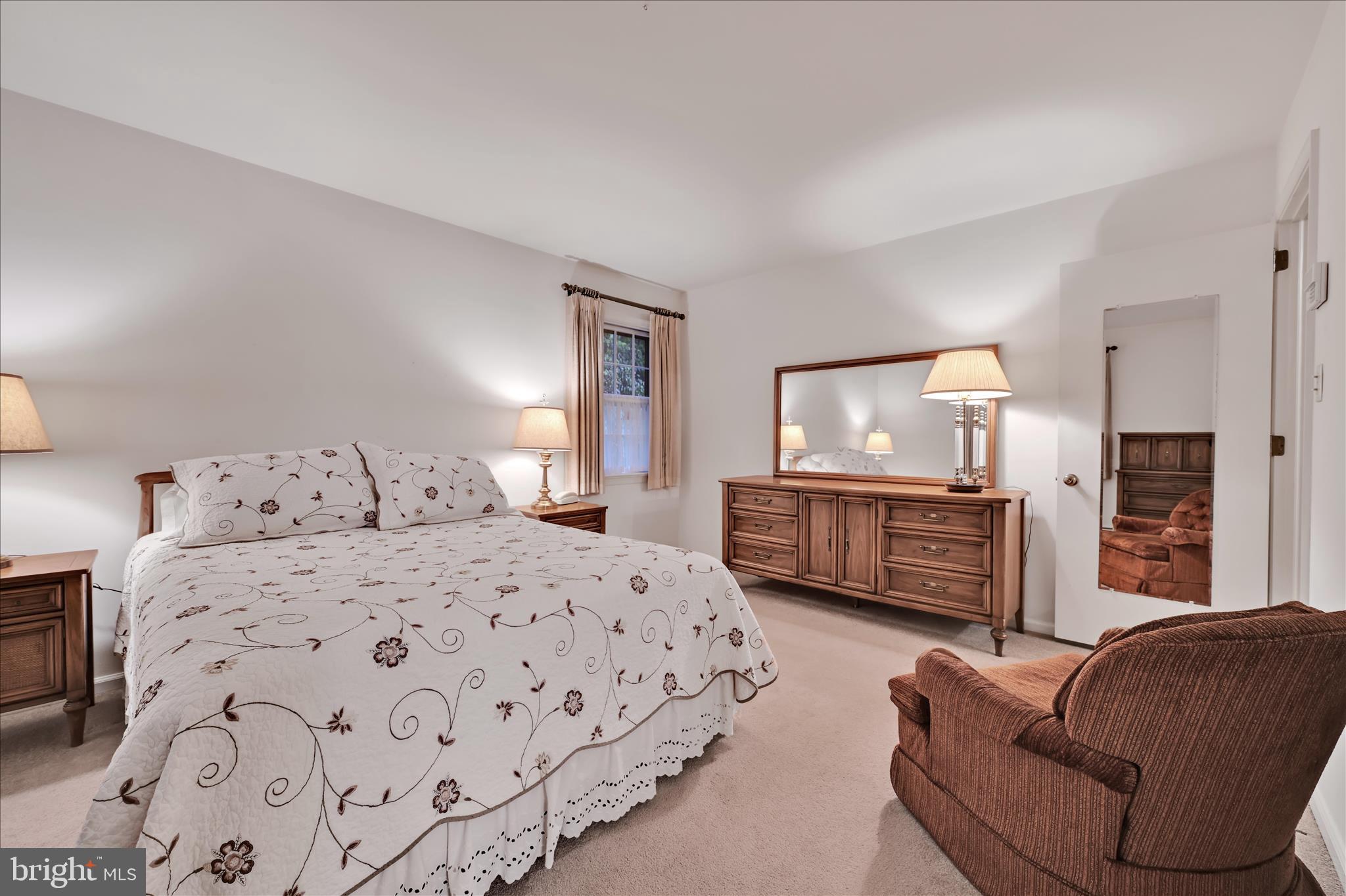 1451 Museum Road Wyomissing, PA 19610 - Photo 26 of 44 a bedroom with a bed window and dresser