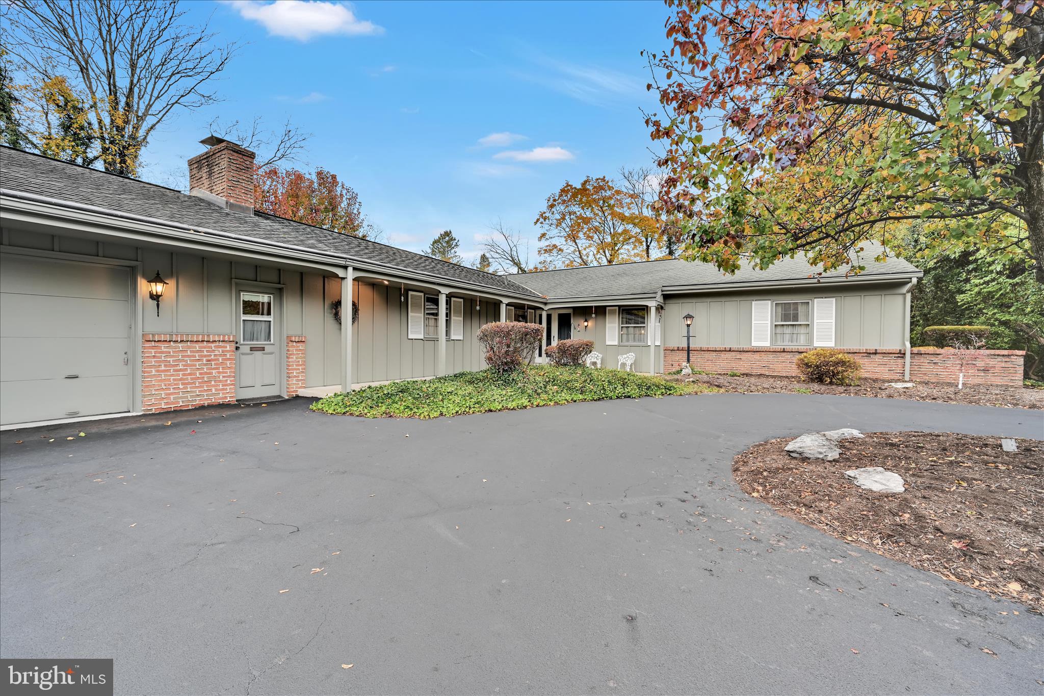 1451 Museum Road Wyomissing, PA 19610 - Photo 3 of 44 a view of the house with a outdoor space