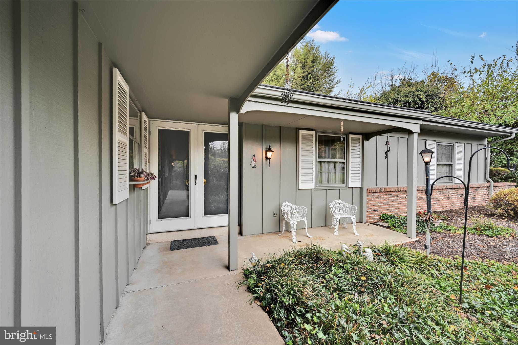 1451 Museum Road Wyomissing, PA 19610 - Photo 7 of 44 a front view of a house with garden