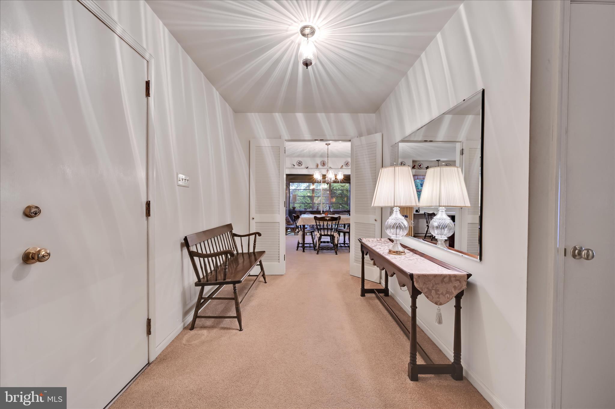 1451 Museum Road Wyomissing, PA 19610 - Photo 10 of 44 a dining room with furniture and a chandelier fan