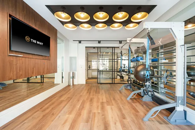 a view of a room with gym equipment