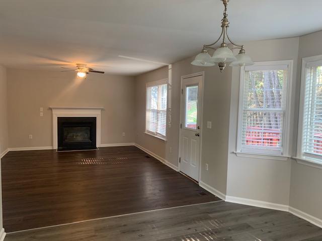 8320 Hobhouse Circle Raleigh, NC 27615 - Photo 4 of 16 a view of livingroom window and wooden floor