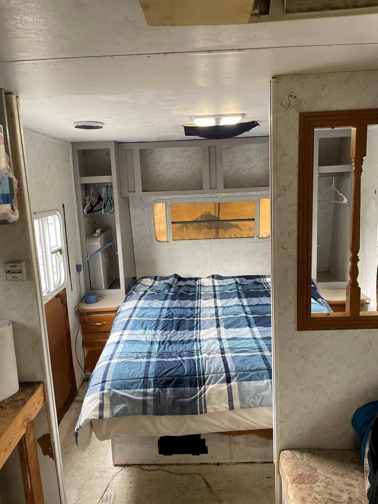 Lot 7 Southwest Fm 2523 Rocksprings, TX 78880 - Photo 17 of 19 a bedroom with a bed and a mirror