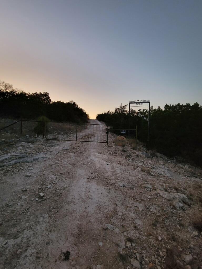 Lot 7 Southwest Fm 2523 Rocksprings, TX 78880 - Photo 2 of 19 a view of a dry yard with trees
