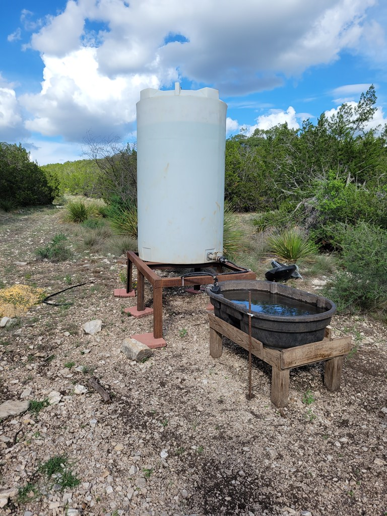 Lot 7 Southwest Fm 2523 Rocksprings, TX 78880 - Photo 8 of 19 a bath tub sitting in the middle of a field