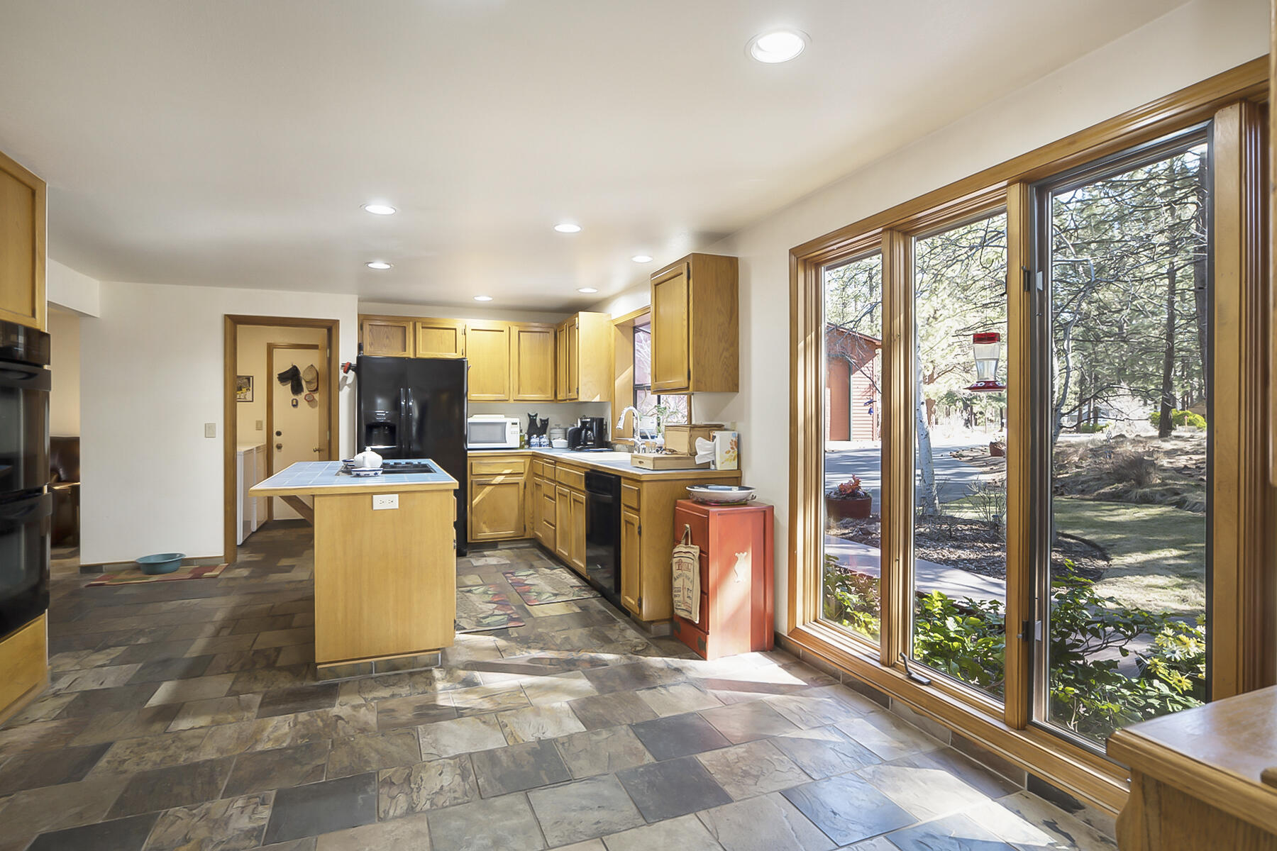 60195 East Ridgeview Drive Bend, OR 97702 - Photo 13 of 59 a view of kitchen with furniture and large window
