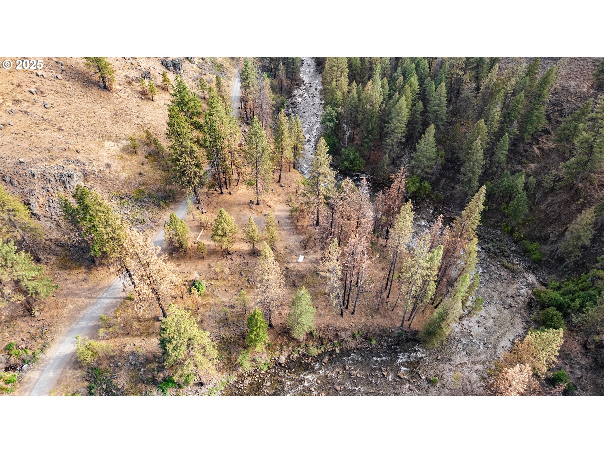 0 Eagle Creek Road Baker City, OR 97814 - Photo 2 of 24 a black and white photo of a house