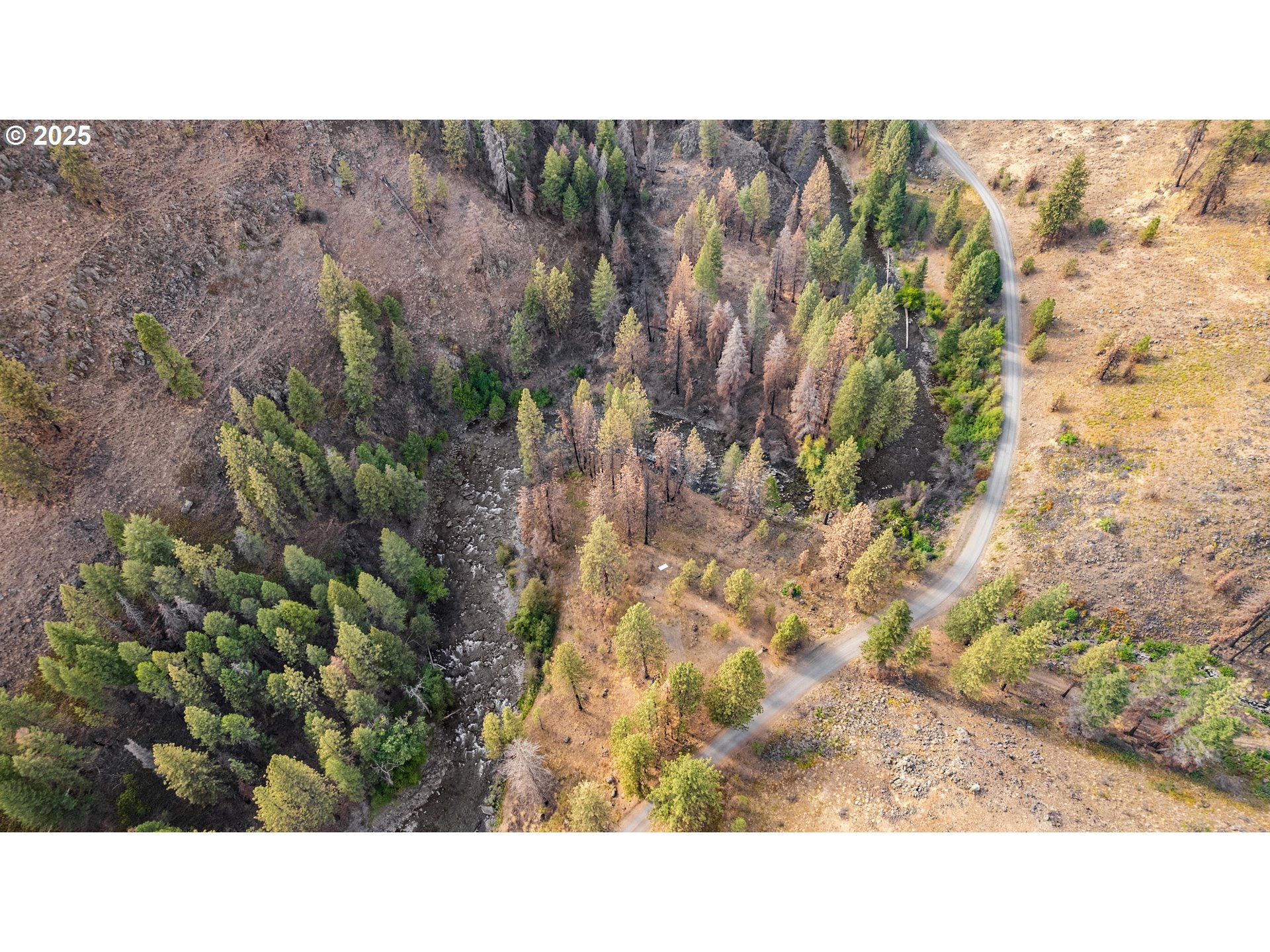 0 Eagle Creek Road Baker City, OR 97814 - Photo 6 of 24 a black and white photo of a house