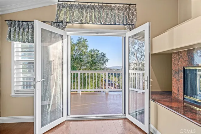 a view of balcony with furniture