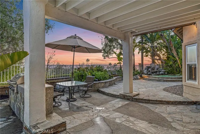 a view of swimming pool from a lounge chair