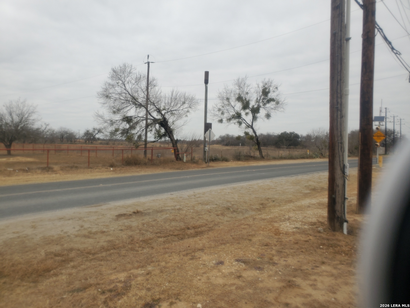 14515 Shepherd Road Atascosa, TX 78002 - Photo 5 of 7 a view of a road with an ocean view