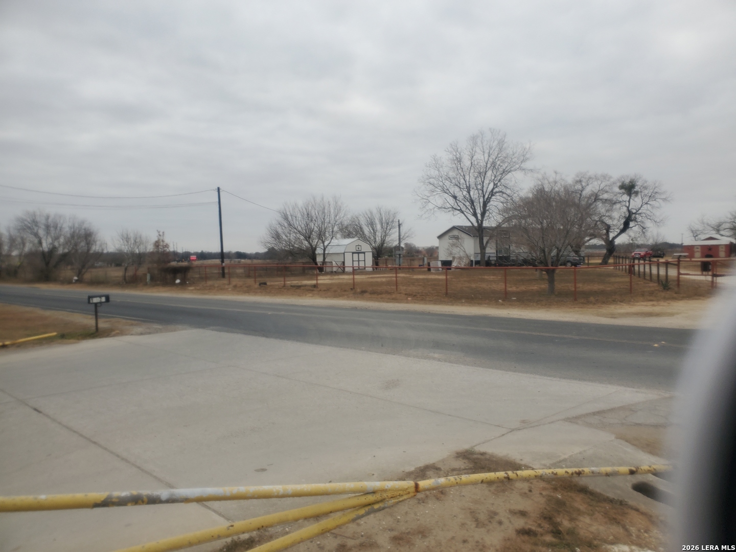 14515 Shepherd Road Atascosa, TX 78002 - Photo 7 of 7 a view of a road with a houses