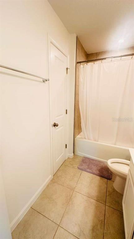 3166 Armstrong Spring Drive Kissimmee, FL 34744 - Photo 20 of 30 a bathroom with a shower and a tub