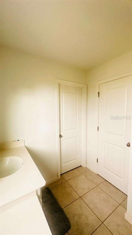 3166 Armstrong Spring Drive Kissimmee, FL 34744 - Photo 25 of 30 a view of a room with an empty space and a sink