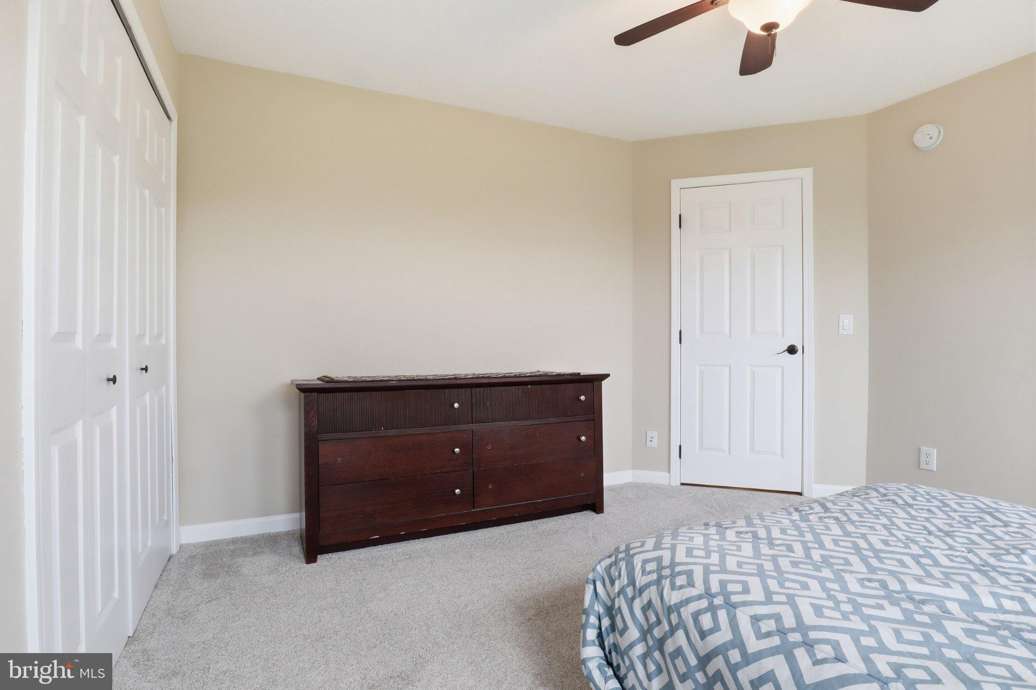 491 Garvine Mill Road Fawn Grove, PA 17321 - Photo 21 of 47 a bedroom with a bed and window