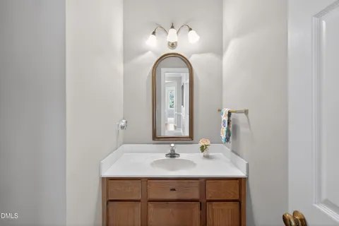 a kitchen with a stove a refrigerator and a sink