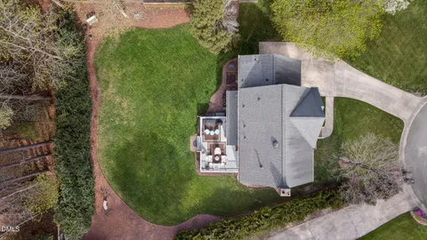 an aerial view of a house with garden