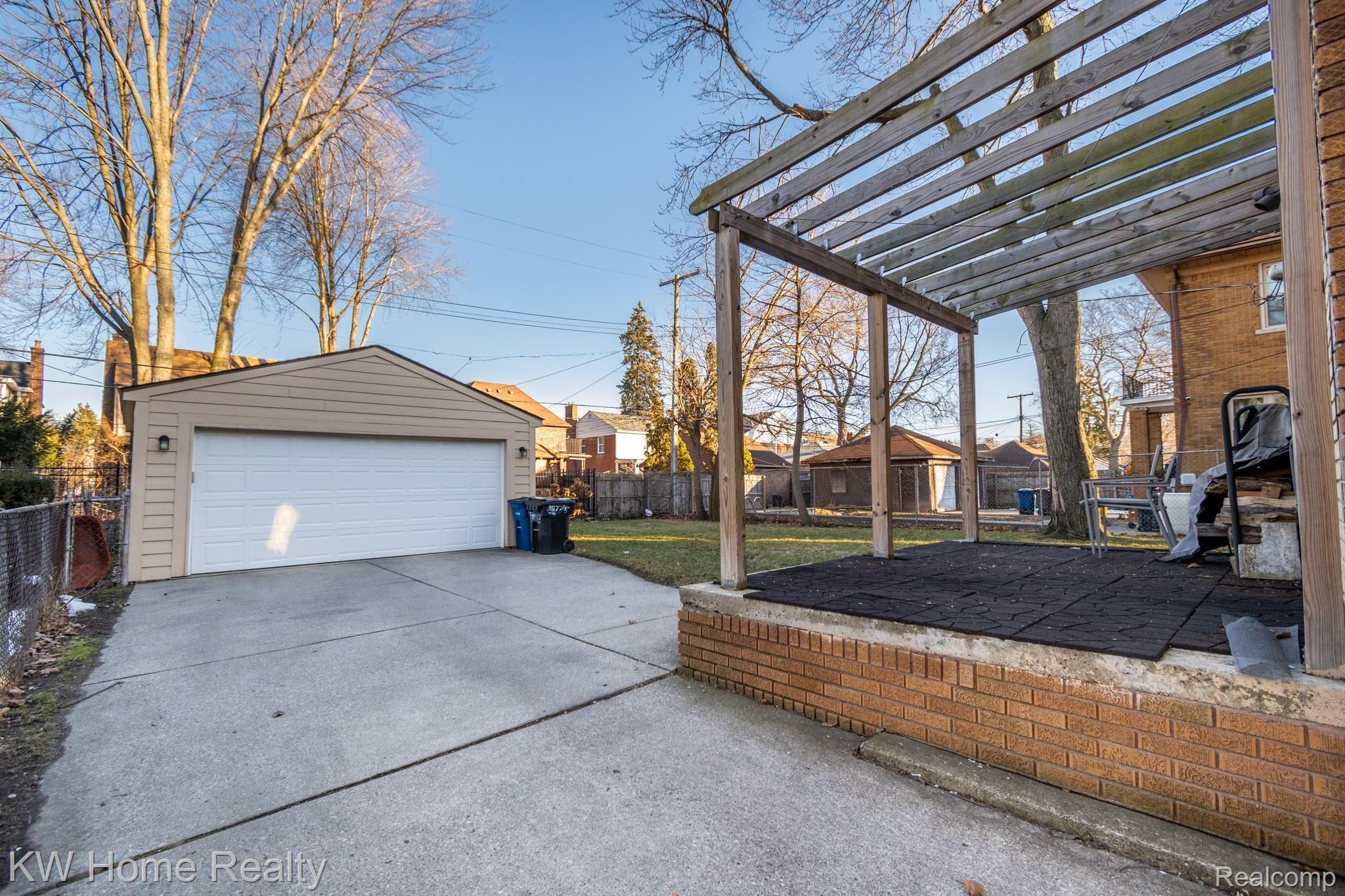 16770 Huntington Road Detroit, MI 48219 - Photo 29 of 30 Back porch and 2 car garage