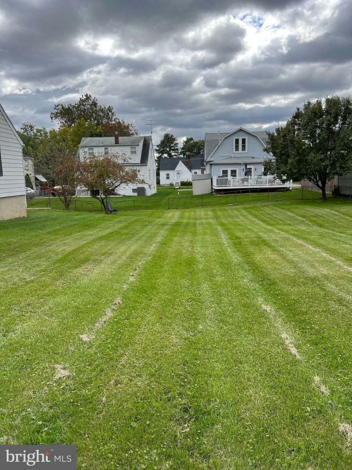 a view of a house with a big yard