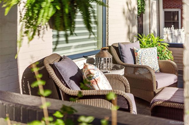 a view of balcony with outdoor seating and plants