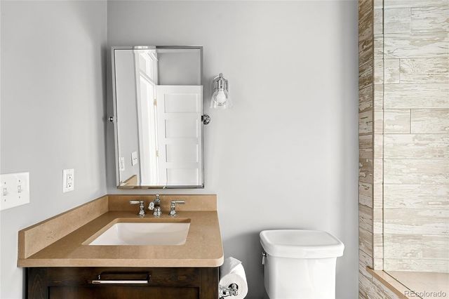 a bathroom with a sink and a toilet