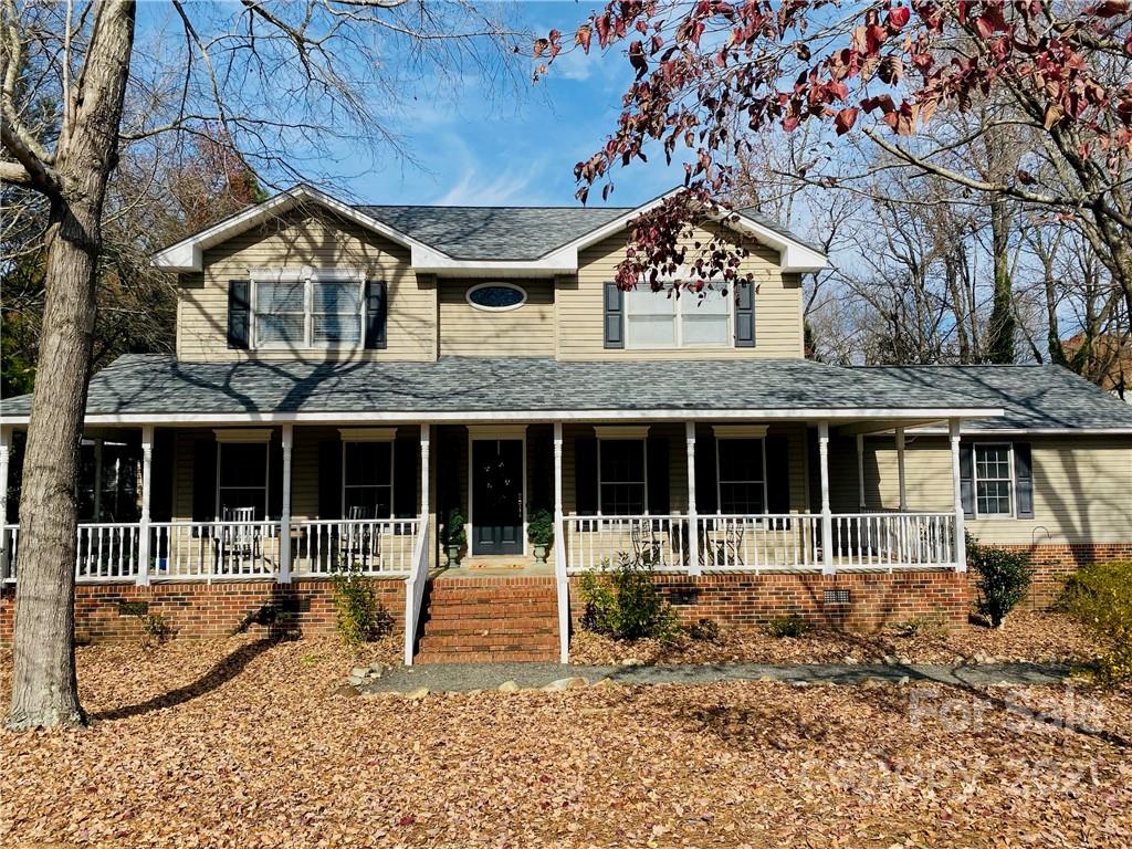 a front view of a house with a porch