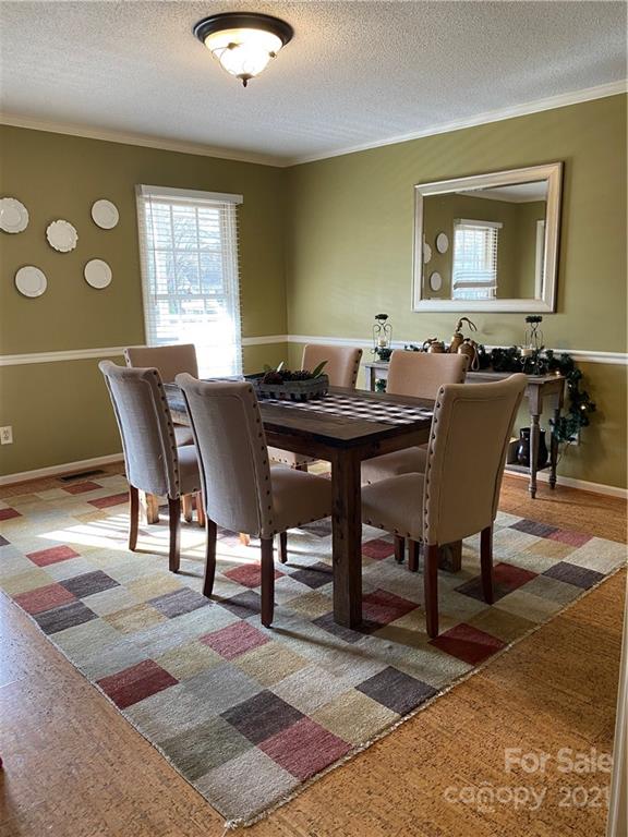 1507 Melchor Road Albemarle, NC 28001 - Photo 11 of 20 a view of a dining room with furniture