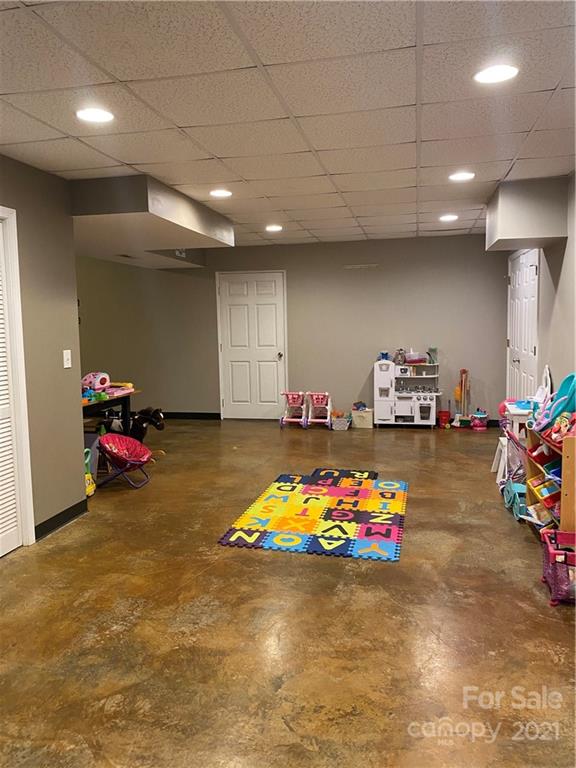 1507 Melchor Road Albemarle, NC 28001 - Photo 17 of 20 a room with toys and a table