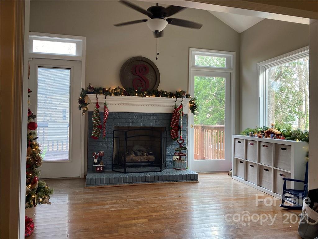 1507 Melchor Road Albemarle, NC 28001 - Photo 7 of 20 a living room with furniture and a fireplace
